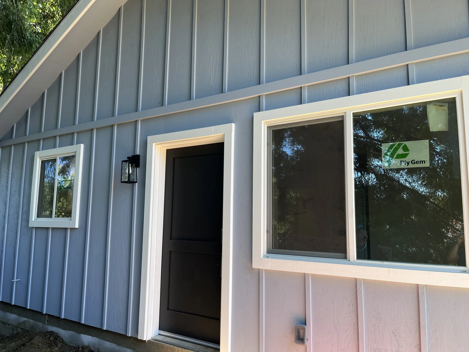 Blue-gray exterior of an accessory dwelling unit